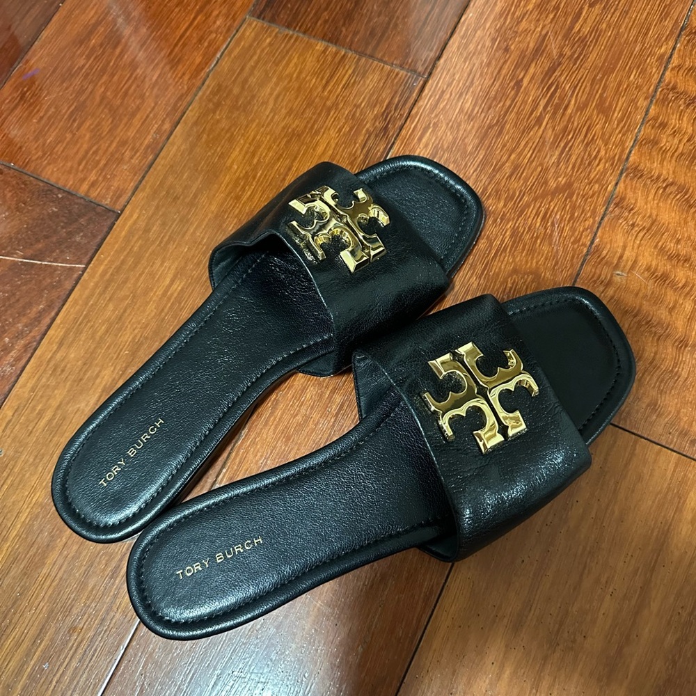 Tory Burch Black Sandals with Gold Emblem